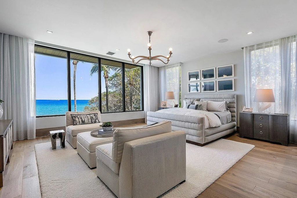 Welcome to 1115 Hillsboro Mile, a luxurious 6-bedrooms, 8-bathrooms home in Hillsboro Beach, Florida. Built in 2017 by Mark Timothy Luxury Homes and Affiniti Architects, this property offers stunning ocean views and a private boat dock.