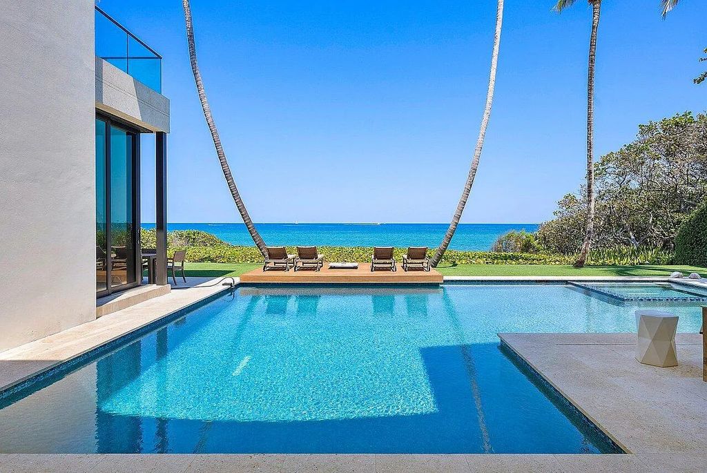 Welcome to 1115 Hillsboro Mile, a luxurious 6-bedrooms, 8-bathrooms home in Hillsboro Beach, Florida. Built in 2017 by Mark Timothy Luxury Homes and Affiniti Architects, this property offers stunning ocean views and a private boat dock.