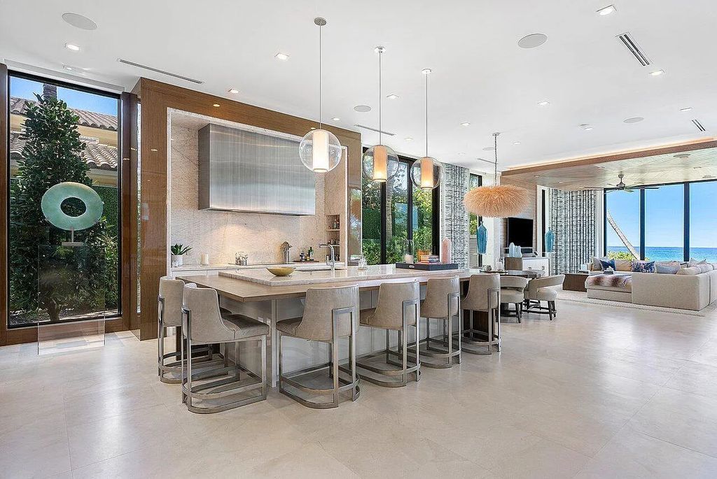 Welcome to 1115 Hillsboro Mile, a luxurious 6-bedrooms, 8-bathrooms home in Hillsboro Beach, Florida. Built in 2017 by Mark Timothy Luxury Homes and Affiniti Architects, this property offers stunning ocean views and a private boat dock.