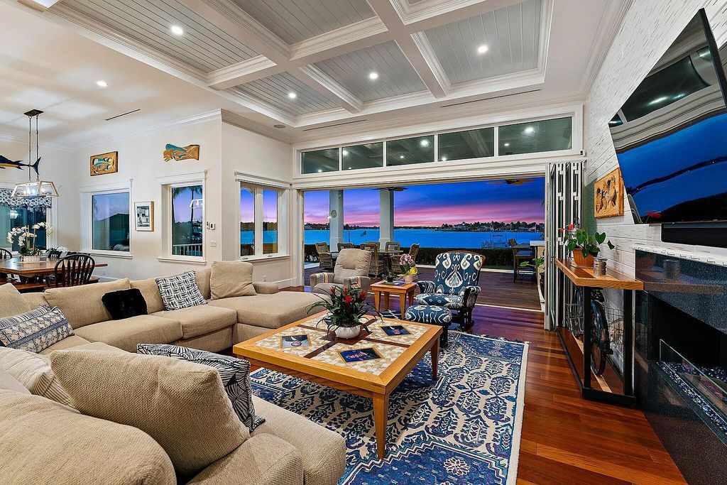 Introducing 5874 Pennock Point Road, a luxurious estate in Jupiter, Florida. This stunning property offers 5 bedrooms, 8 bathrooms, and 7,434 square feet of living space.