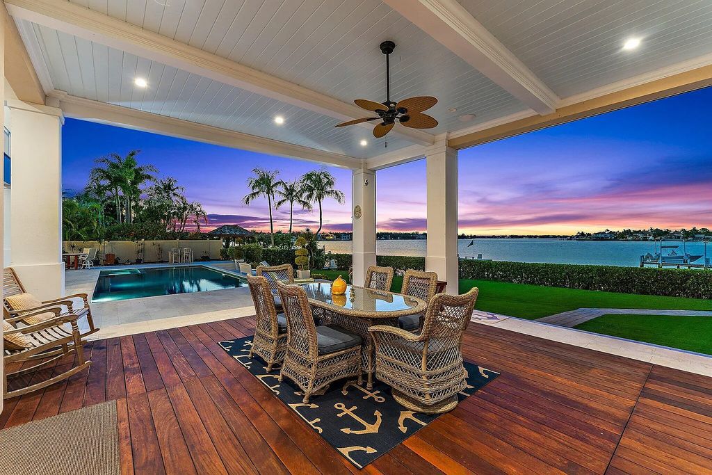 Introducing 5874 Pennock Point Road, a luxurious estate in Jupiter, Florida. This stunning property offers 5 bedrooms, 8 bathrooms, and 7,434 square feet of living space.