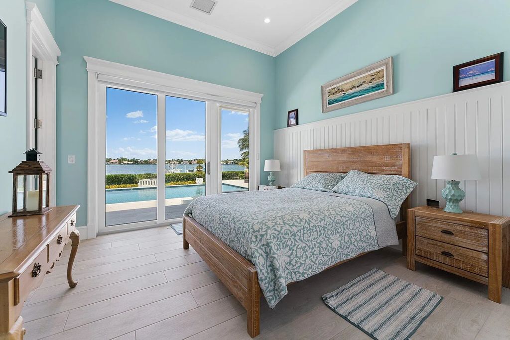 Introducing 5874 Pennock Point Road, a luxurious estate in Jupiter, Florida. This stunning property offers 5 bedrooms, 8 bathrooms, and 7,434 square feet of living space.