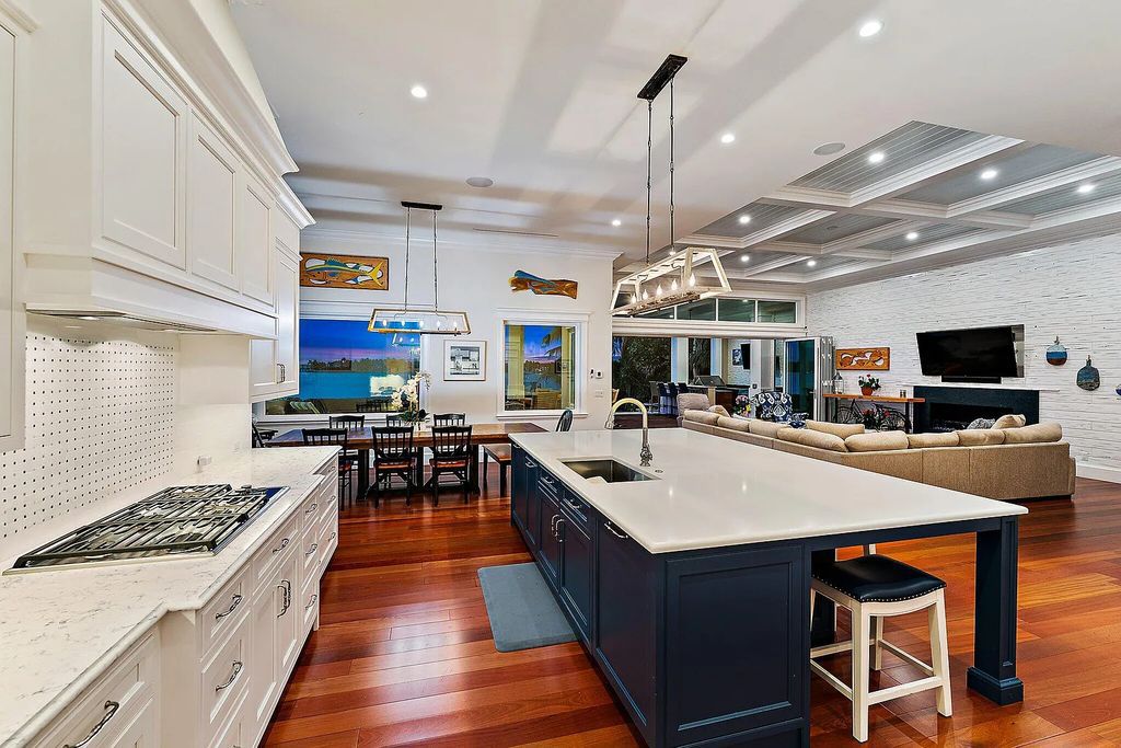 Introducing 5874 Pennock Point Road, a luxurious estate in Jupiter, Florida. This stunning property offers 5 bedrooms, 8 bathrooms, and 7,434 square feet of living space.