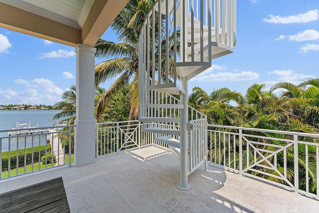 Introducing 5874 Pennock Point Road, a luxurious estate in Jupiter, Florida. This stunning property offers 5 bedrooms, 8 bathrooms, and 7,434 square feet of living space.