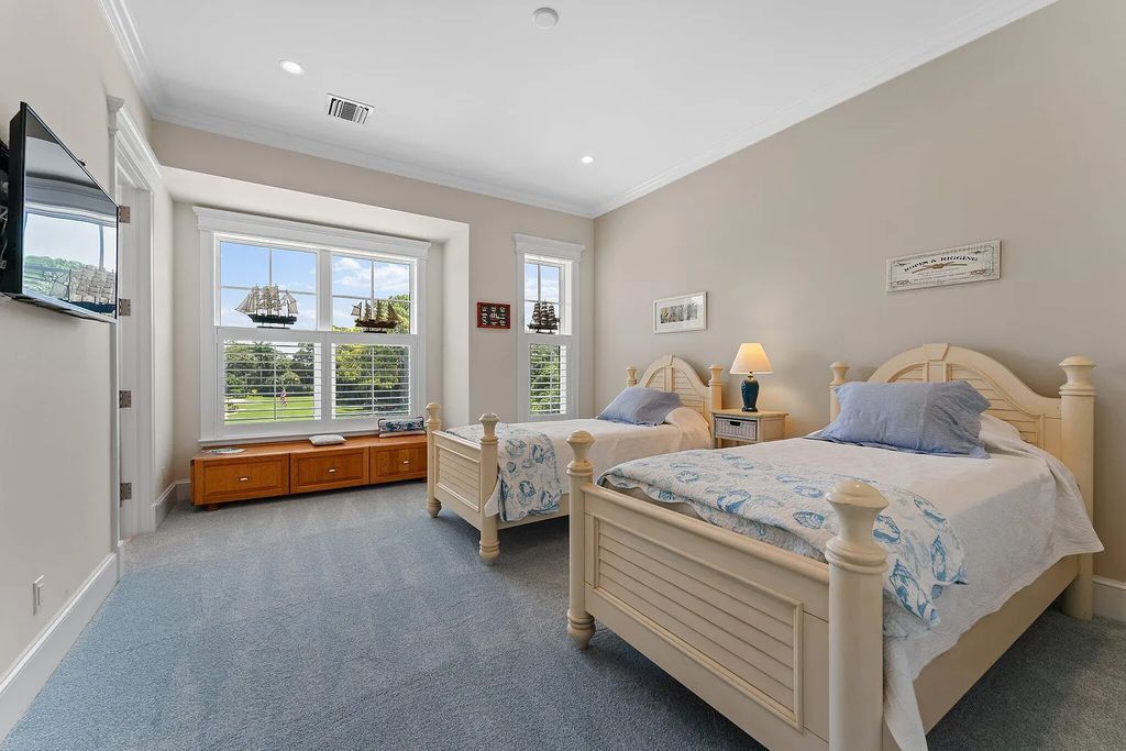 Introducing 5874 Pennock Point Road, a luxurious estate in Jupiter, Florida. This stunning property offers 5 bedrooms, 8 bathrooms, and 7,434 square feet of living space.