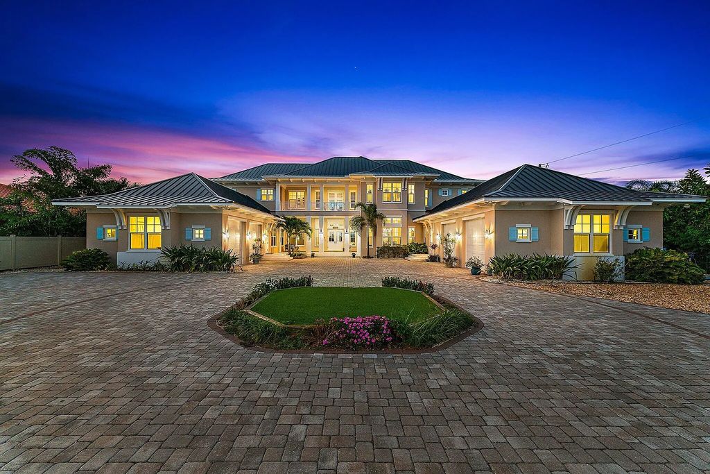 Introducing 5874 Pennock Point Road, a luxurious estate in Jupiter, Florida. This stunning property offers 5 bedrooms, 8 bathrooms, and 7,434 square feet of living space.