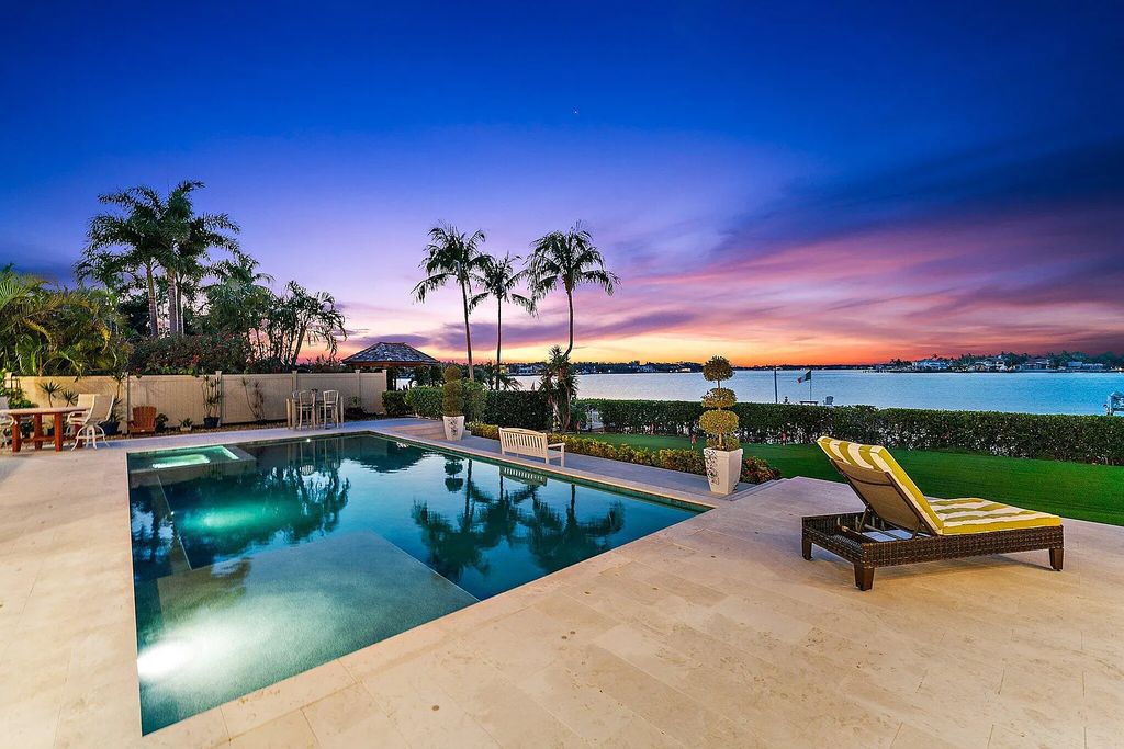 Introducing 5874 Pennock Point Road, a luxurious estate in Jupiter, Florida. This stunning property offers 5 bedrooms, 8 bathrooms, and 7,434 square feet of living space.