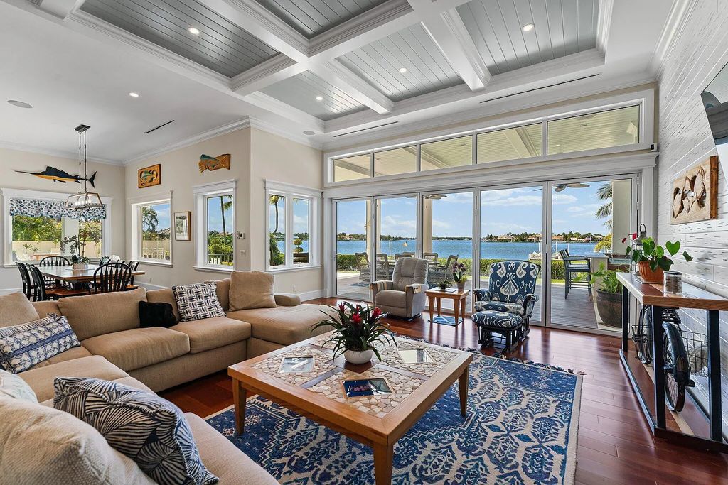 Introducing 5874 Pennock Point Road, a luxurious estate in Jupiter, Florida. This stunning property offers 5 bedrooms, 8 bathrooms, and 7,434 square feet of living space.