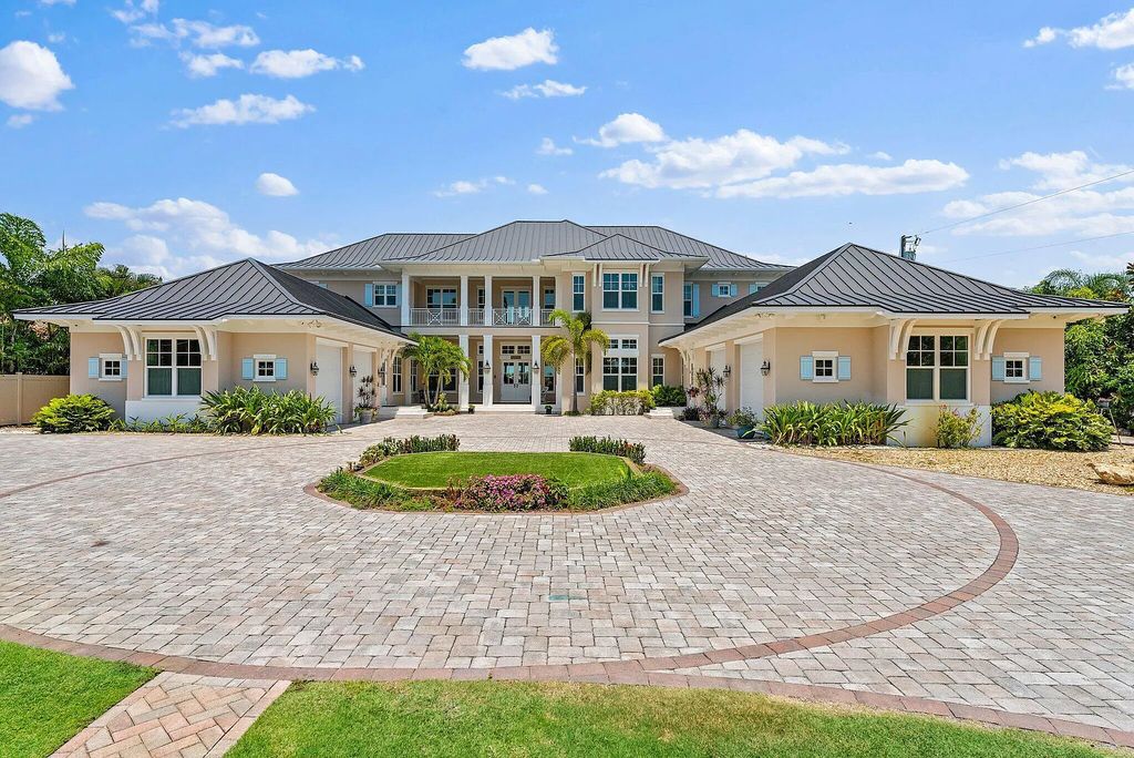 Introducing 5874 Pennock Point Road, a luxurious estate in Jupiter, Florida. This stunning property offers 5 bedrooms, 8 bathrooms, and 7,434 square feet of living space.