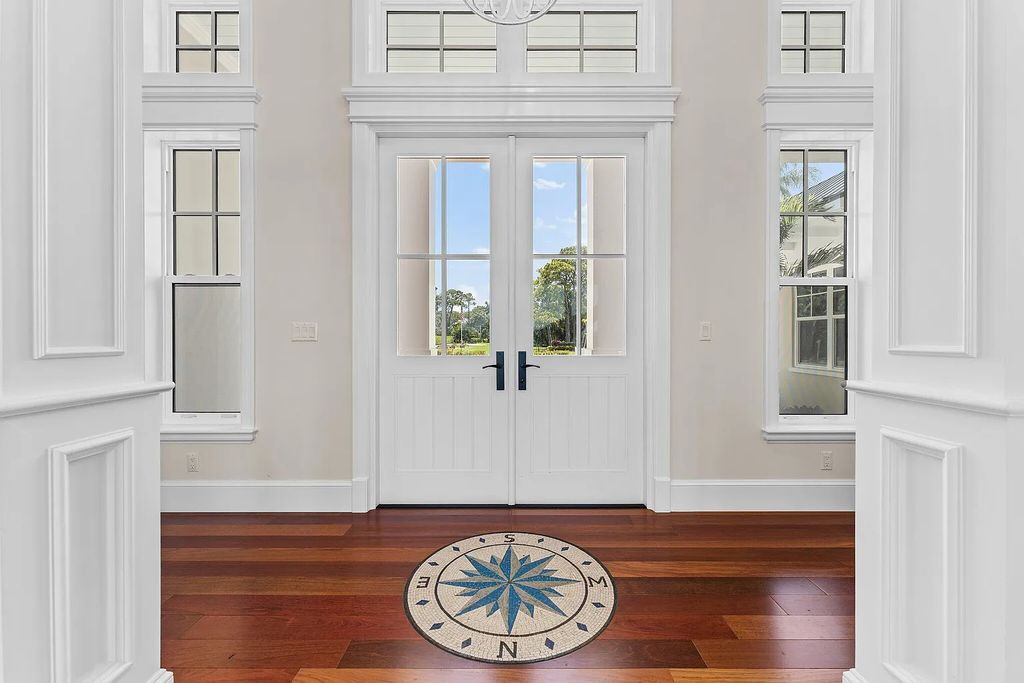 Introducing 5874 Pennock Point Road, a luxurious estate in Jupiter, Florida. This stunning property offers 5 bedrooms, 8 bathrooms, and 7,434 square feet of living space.