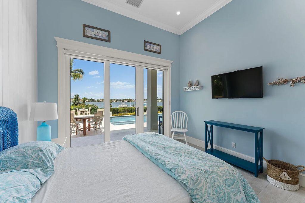 Introducing 5874 Pennock Point Road, a luxurious estate in Jupiter, Florida. This stunning property offers 5 bedrooms, 8 bathrooms, and 7,434 square feet of living space.