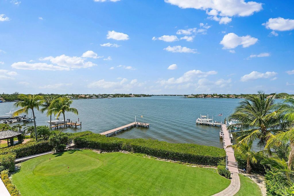Introducing 5874 Pennock Point Road, a luxurious estate in Jupiter, Florida. This stunning property offers 5 bedrooms, 8 bathrooms, and 7,434 square feet of living space.