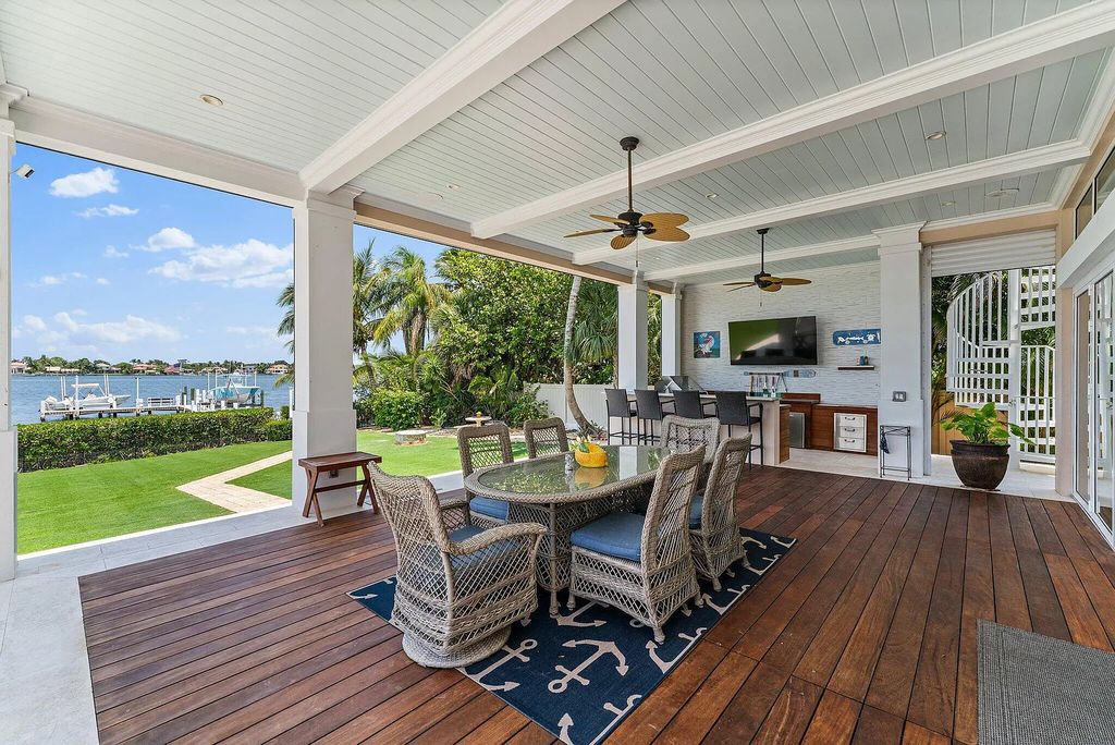 Introducing 5874 Pennock Point Road, a luxurious estate in Jupiter, Florida. This stunning property offers 5 bedrooms, 8 bathrooms, and 7,434 square feet of living space.