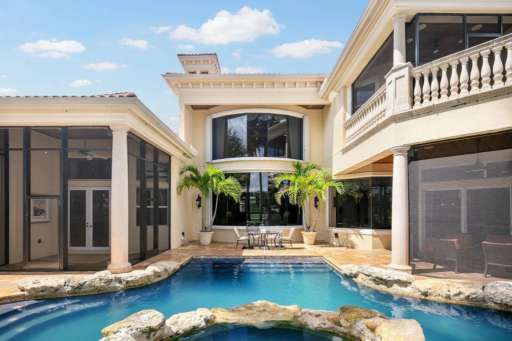 Discover 8382 Del Prado Drive, a luxurious residence in Delray Beach's acclaimed Mizner Country Club. With 5 bedrooms, 8 bathrooms, and 7,684 square feet of living space, this meticulously designed home offers artisanal beauty, Mediterranean ambience, and comfort.
