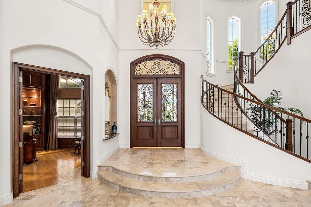 Discover 8382 Del Prado Drive, a luxurious residence in Delray Beach's acclaimed Mizner Country Club. With 5 bedrooms, 8 bathrooms, and 7,684 square feet of living space, this meticulously designed home offers artisanal beauty, Mediterranean ambience, and comfort.
