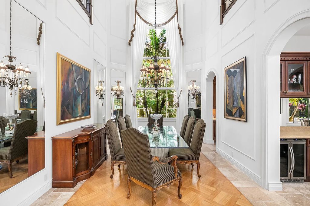 Discover 8382 Del Prado Drive, a luxurious residence in Delray Beach's acclaimed Mizner Country Club. With 5 bedrooms, 8 bathrooms, and 7,684 square feet of living space, this meticulously designed home offers artisanal beauty, Mediterranean ambience, and comfort.
