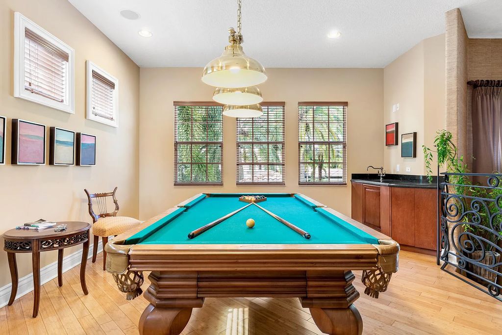 Discover 8382 Del Prado Drive, a luxurious residence in Delray Beach's acclaimed Mizner Country Club. With 5 bedrooms, 8 bathrooms, and 7,684 square feet of living space, this meticulously designed home offers artisanal beauty, Mediterranean ambience, and comfort.