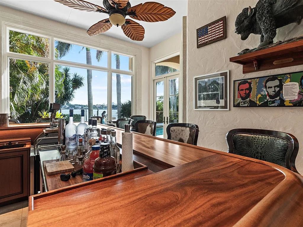 Experience luxury living at its finest with Bellissimo Palazzo at 2020 Brightwaters Boulevard NE, a prestigious waterfront estate in Saint Petersburg, Florida. This Italian-inspired masterpiece boasts 5 bedrooms, 9 bathrooms, and over 9,700 square feet of opulent living space. Immerse yourself in timeless architecture, exquisite finishes, and breathtaking waterfront views.