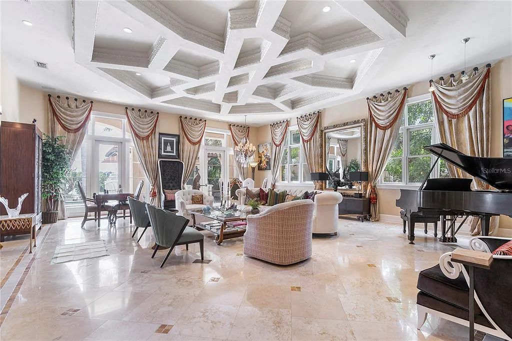 Experience luxury living at its finest with Bellissimo Palazzo at 2020 Brightwaters Boulevard NE, a prestigious waterfront estate in Saint Petersburg, Florida. This Italian-inspired masterpiece boasts 5 bedrooms, 9 bathrooms, and over 9,700 square feet of opulent living space. Immerse yourself in timeless architecture, exquisite finishes, and breathtaking waterfront views.