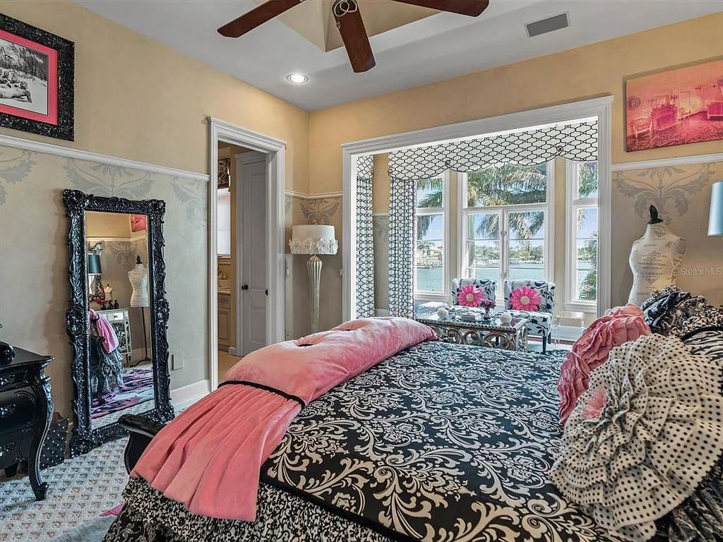 Experience luxury living at its finest with Bellissimo Palazzo at 2020 Brightwaters Boulevard NE, a prestigious waterfront estate in Saint Petersburg, Florida. This Italian-inspired masterpiece boasts 5 bedrooms, 9 bathrooms, and over 9,700 square feet of opulent living space. Immerse yourself in timeless architecture, exquisite finishes, and breathtaking waterfront views.
