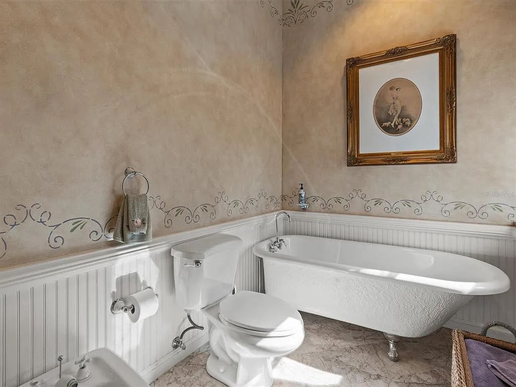 Experience luxury living at its finest with Bellissimo Palazzo at 2020 Brightwaters Boulevard NE, a prestigious waterfront estate in Saint Petersburg, Florida. This Italian-inspired masterpiece boasts 5 bedrooms, 9 bathrooms, and over 9,700 square feet of opulent living space. Immerse yourself in timeless architecture, exquisite finishes, and breathtaking waterfront views.