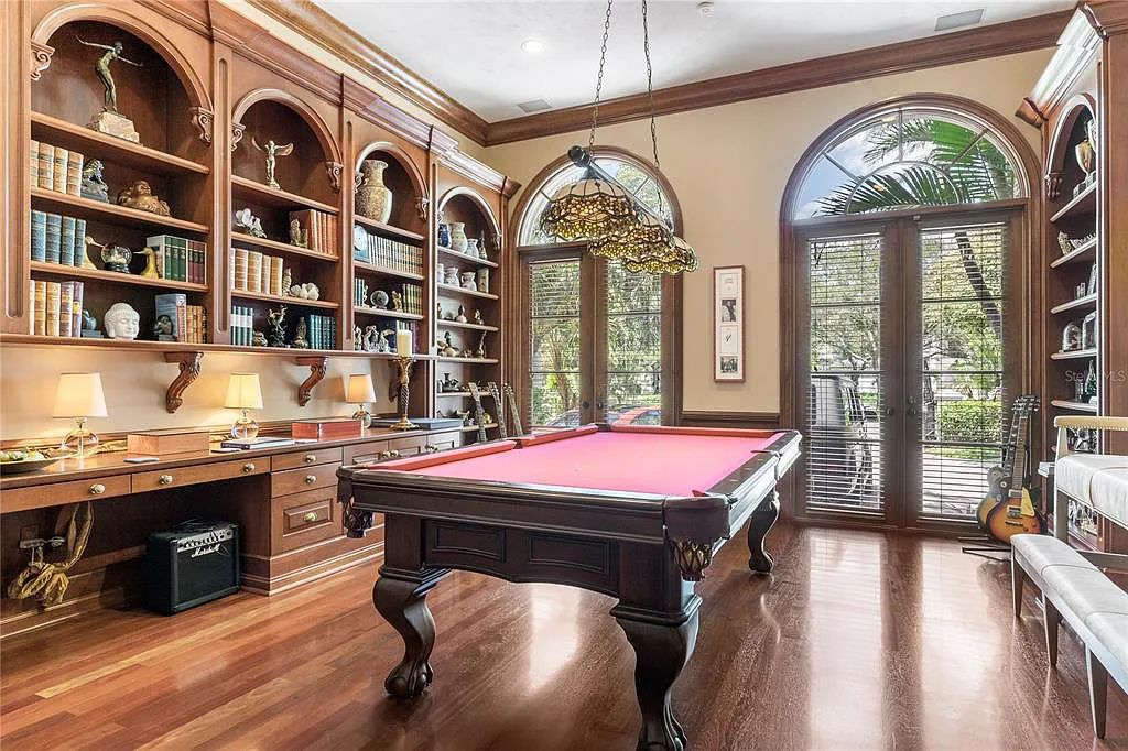 Experience luxury living at its finest with Bellissimo Palazzo at 2020 Brightwaters Boulevard NE, a prestigious waterfront estate in Saint Petersburg, Florida. This Italian-inspired masterpiece boasts 5 bedrooms, 9 bathrooms, and over 9,700 square feet of opulent living space. Immerse yourself in timeless architecture, exquisite finishes, and breathtaking waterfront views.