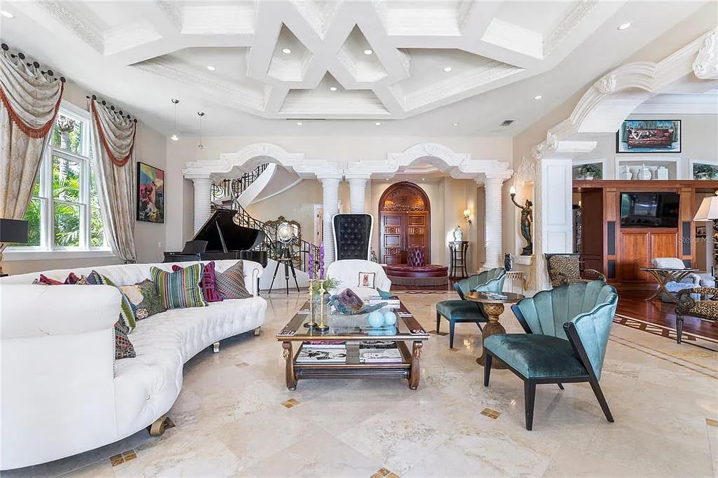Experience luxury living at its finest with Bellissimo Palazzo at 2020 Brightwaters Boulevard NE, a prestigious waterfront estate in Saint Petersburg, Florida. This Italian-inspired masterpiece boasts 5 bedrooms, 9 bathrooms, and over 9,700 square feet of opulent living space. Immerse yourself in timeless architecture, exquisite finishes, and breathtaking waterfront views.