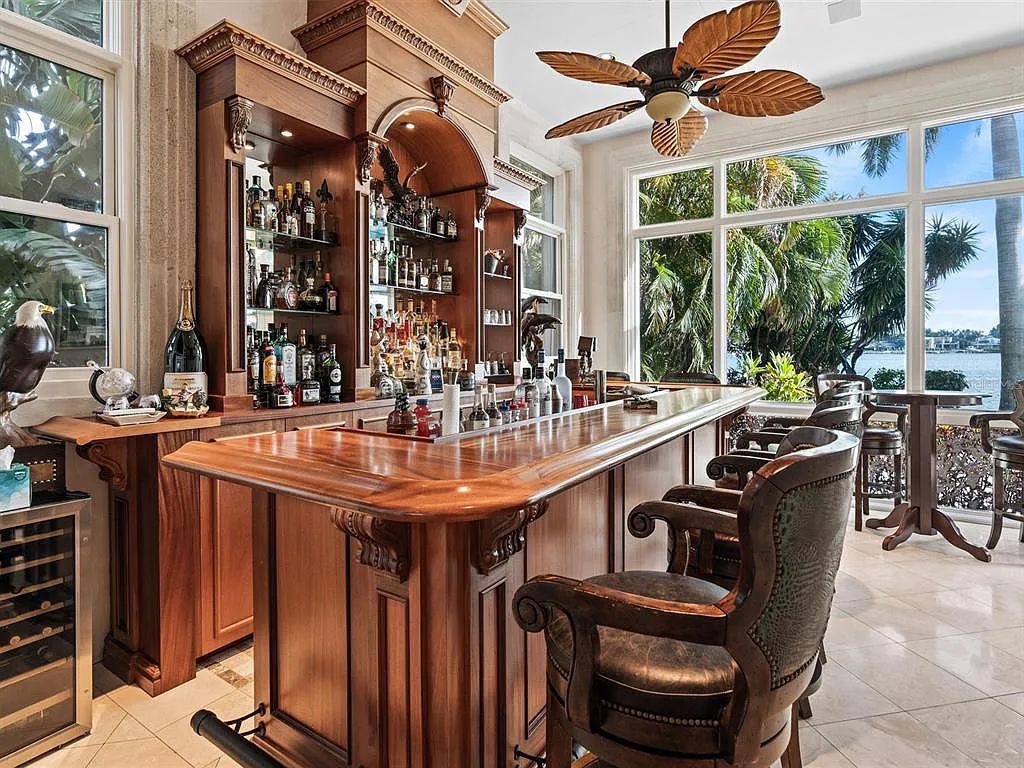Experience luxury living at its finest with Bellissimo Palazzo at 2020 Brightwaters Boulevard NE, a prestigious waterfront estate in Saint Petersburg, Florida. This Italian-inspired masterpiece boasts 5 bedrooms, 9 bathrooms, and over 9,700 square feet of opulent living space. Immerse yourself in timeless architecture, exquisite finishes, and breathtaking waterfront views.
