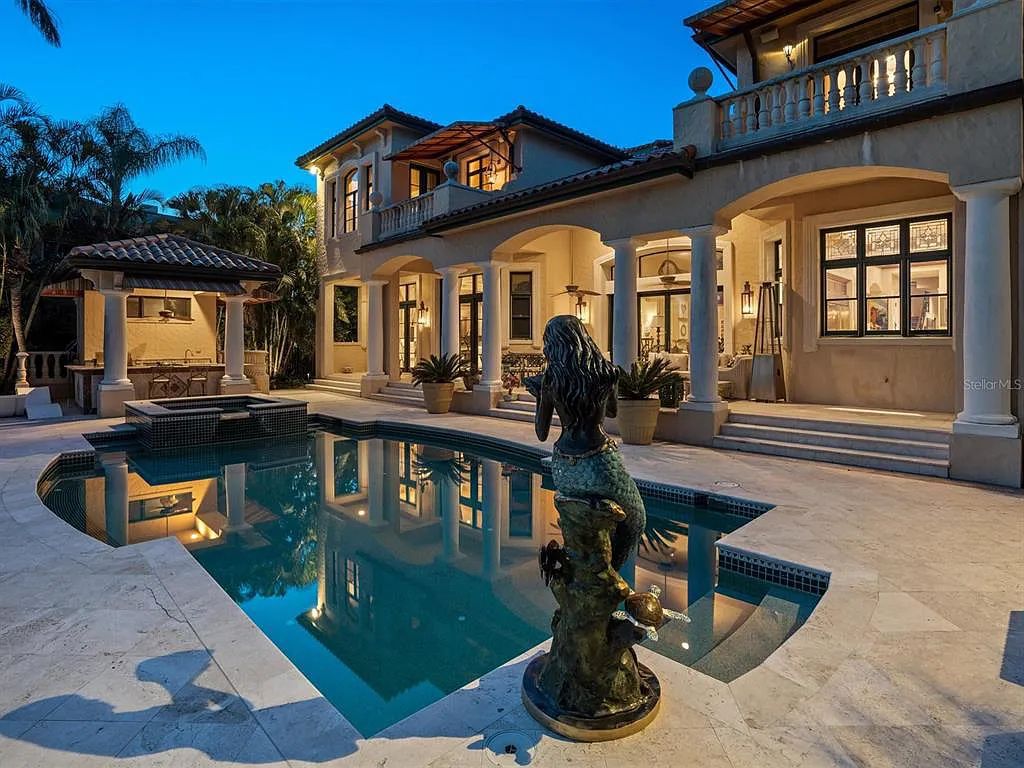 Experience luxury living at its finest with Bellissimo Palazzo at 2020 Brightwaters Boulevard NE, a prestigious waterfront estate in Saint Petersburg, Florida. This Italian-inspired masterpiece boasts 5 bedrooms, 9 bathrooms, and over 9,700 square feet of opulent living space. Immerse yourself in timeless architecture, exquisite finishes, and breathtaking waterfront views.