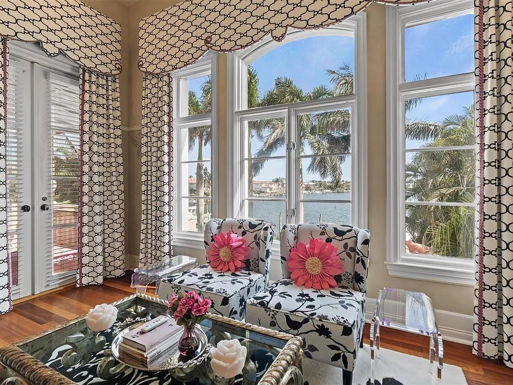 Experience luxury living at its finest with Bellissimo Palazzo at 2020 Brightwaters Boulevard NE, a prestigious waterfront estate in Saint Petersburg, Florida. This Italian-inspired masterpiece boasts 5 bedrooms, 9 bathrooms, and over 9,700 square feet of opulent living space. Immerse yourself in timeless architecture, exquisite finishes, and breathtaking waterfront views.
