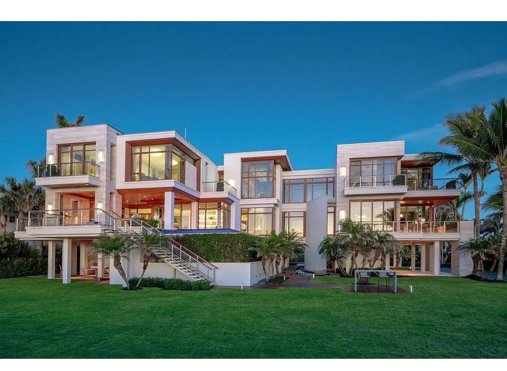 Introducing 25 16th Avenue S, a magnificent beachfront estate in Naples, Florida. This modern masterpiece, designed by Stofft Cooney Architects, LLC and constructed by Newbury North Associates, Inc., offers captivating views of Naples beach and the Gulf of Mexico.
