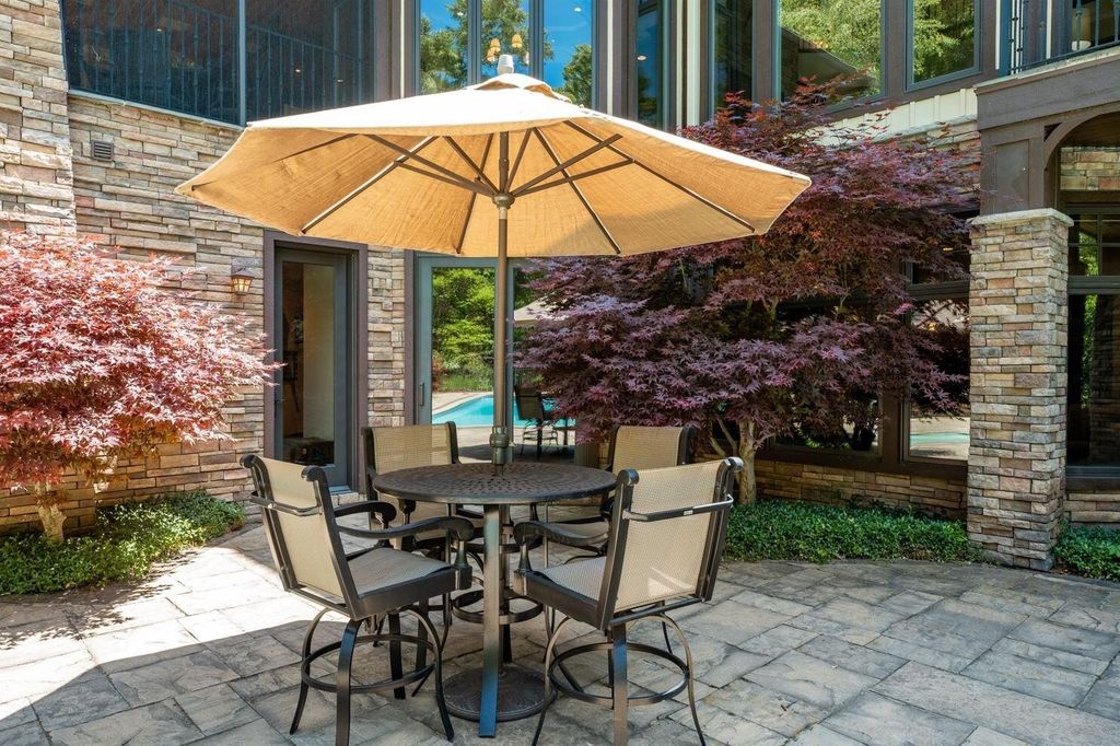 Unveiling an Exquisite Retreat: Captivating 5-Acre Wooded Estate in Skyevale's Gated Community Now Available for $3.75M