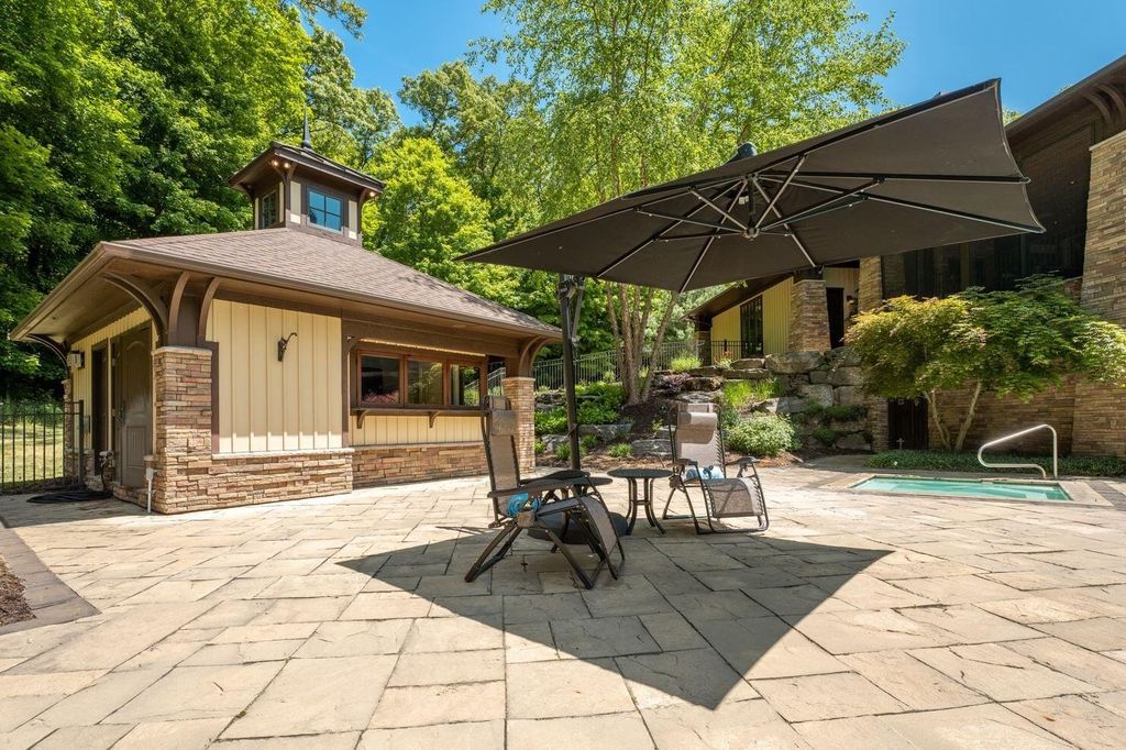 Unveiling an Exquisite Retreat: Captivating 5-Acre Wooded Estate in Skyevale's Gated Community Now Available for $3.75M