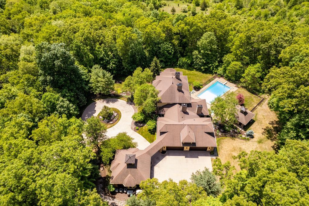Unveiling an Exquisite Retreat: Captivating 5-Acre Wooded Estate in Skyevale's Gated Community Now Available for $3.75M