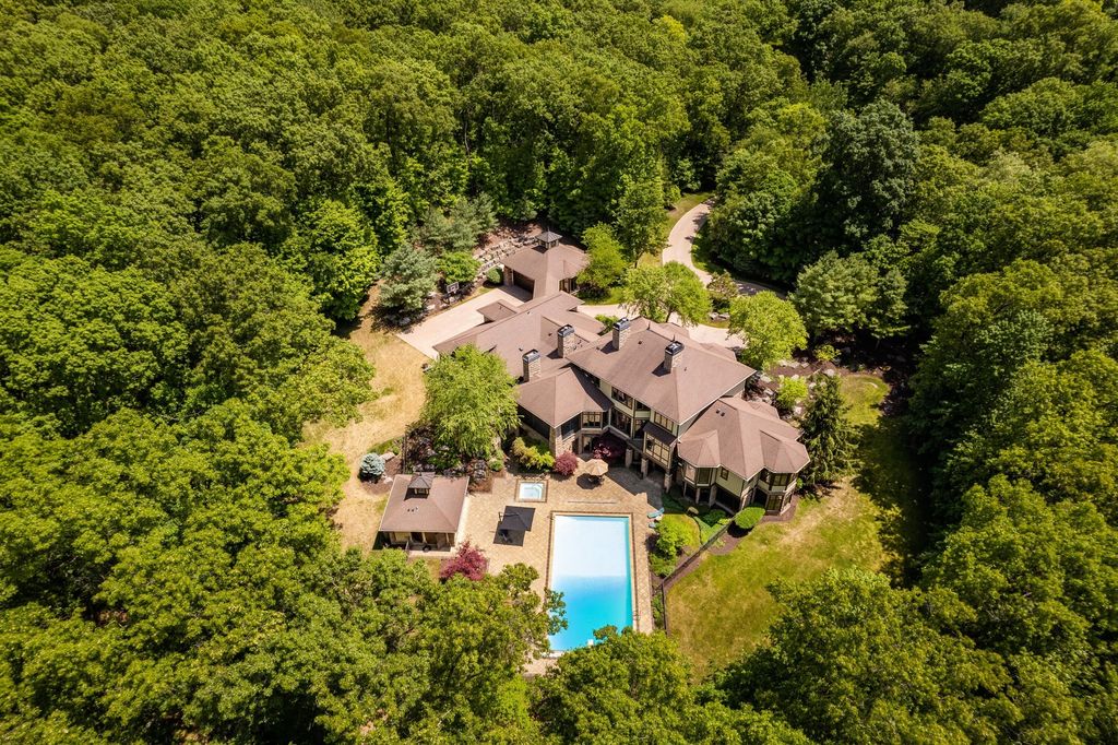 Unveiling an Exquisite Retreat: Captivating 5-Acre Wooded Estate in Skyevale's Gated Community Now Available for $3.75M