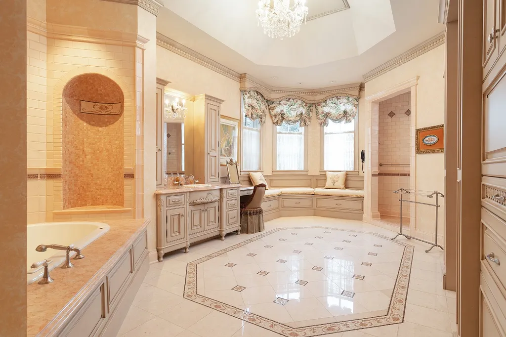 1558 Dutton Road Home in Rochester, Michigan. Discover the epitome of luxury living at this Country Estate in Oakland Township. Spread across 22 acres, the home features hand-carved wooden archways, hand-painted ceiling frescos, and hand-cut stone and gold-leafed accents.