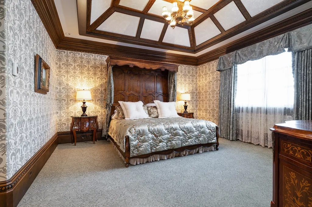 1558 Dutton Road Home in Rochester, Michigan. Discover the epitome of luxury living at this Country Estate in Oakland Township. Spread across 22 acres, the home features hand-carved wooden archways, hand-painted ceiling frescos, and hand-cut stone and gold-leafed accents.