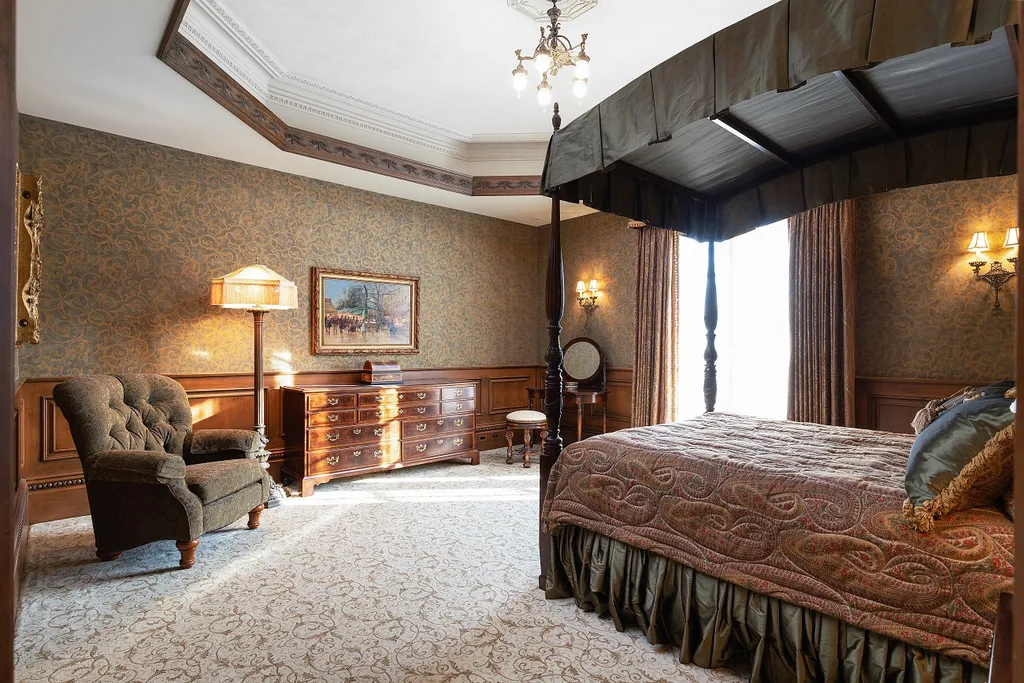 1558 Dutton Road Home in Rochester, Michigan. Discover the epitome of luxury living at this Country Estate in Oakland Township. Spread across 22 acres, the home features hand-carved wooden archways, hand-painted ceiling frescos, and hand-cut stone and gold-leafed accents.