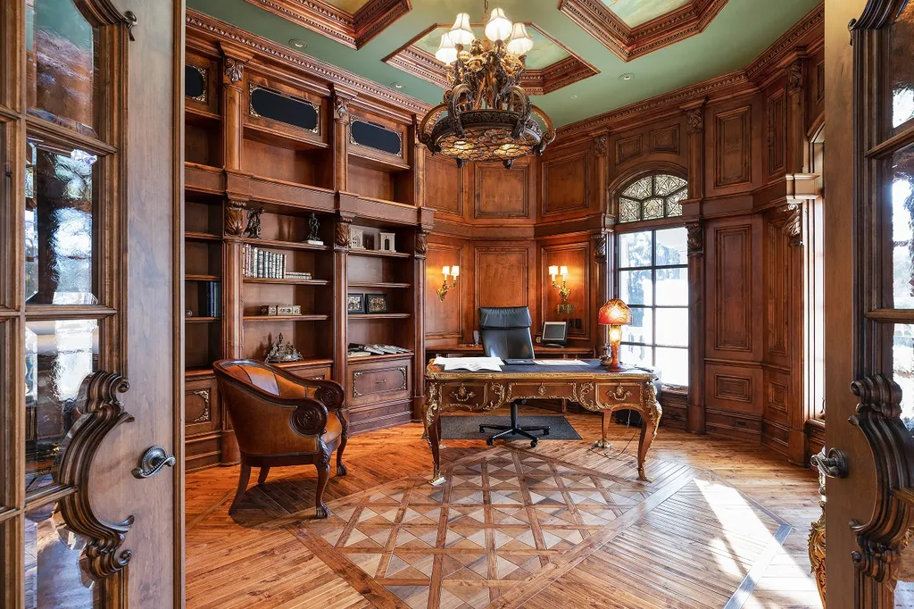 1558 Dutton Road Home in Rochester, Michigan. Discover the epitome of luxury living at this Country Estate in Oakland Township. Spread across 22 acres, the home features hand-carved wooden archways, hand-painted ceiling frescos, and hand-cut stone and gold-leafed accents.
