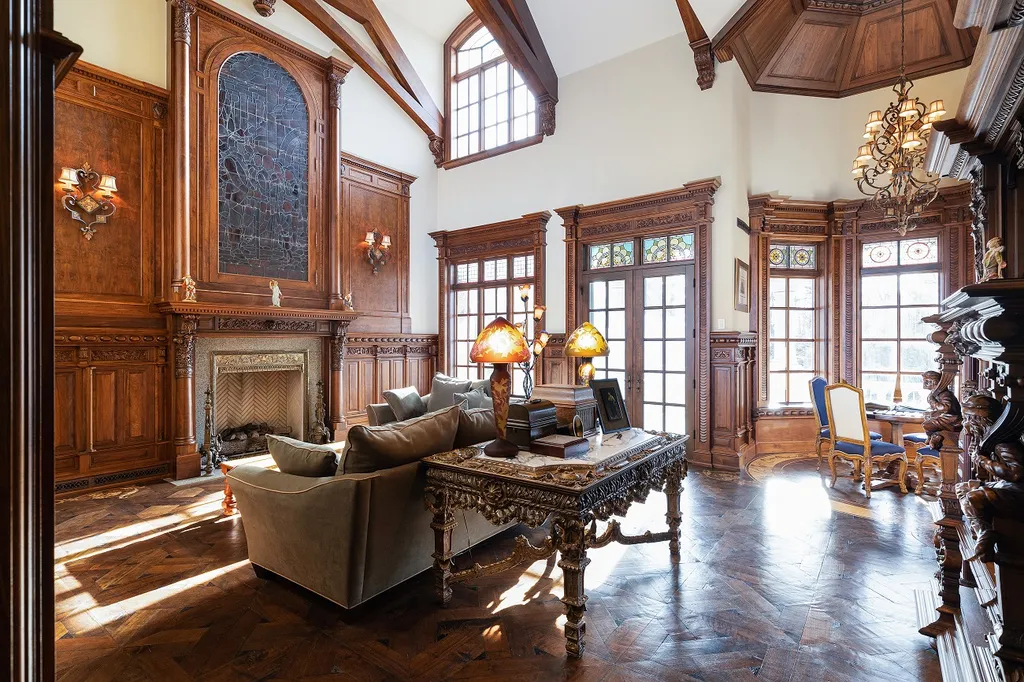 1558 Dutton Road Home in Rochester, Michigan. Discover the epitome of luxury living at this Country Estate in Oakland Township. Spread across 22 acres, the home features hand-carved wooden archways, hand-painted ceiling frescos, and hand-cut stone and gold-leafed accents.