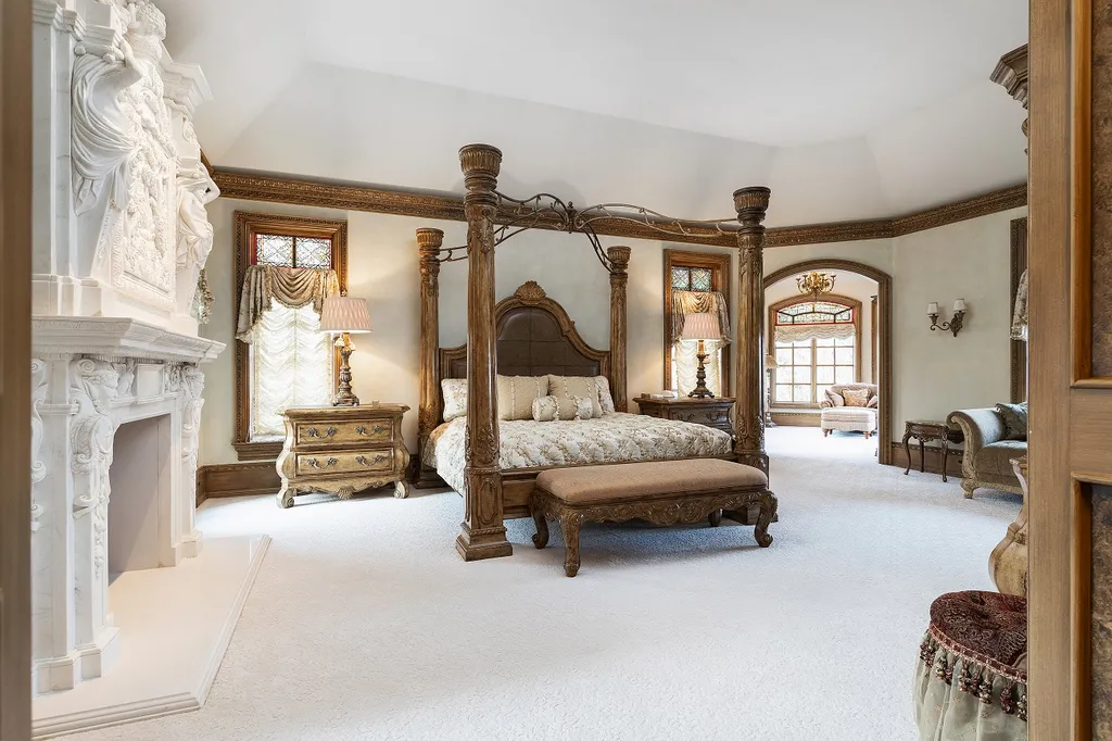 1558 Dutton Road Home in Rochester, Michigan. Discover the epitome of luxury living at this Country Estate in Oakland Township. Spread across 22 acres, the home features hand-carved wooden archways, hand-painted ceiling frescos, and hand-cut stone and gold-leafed accents.