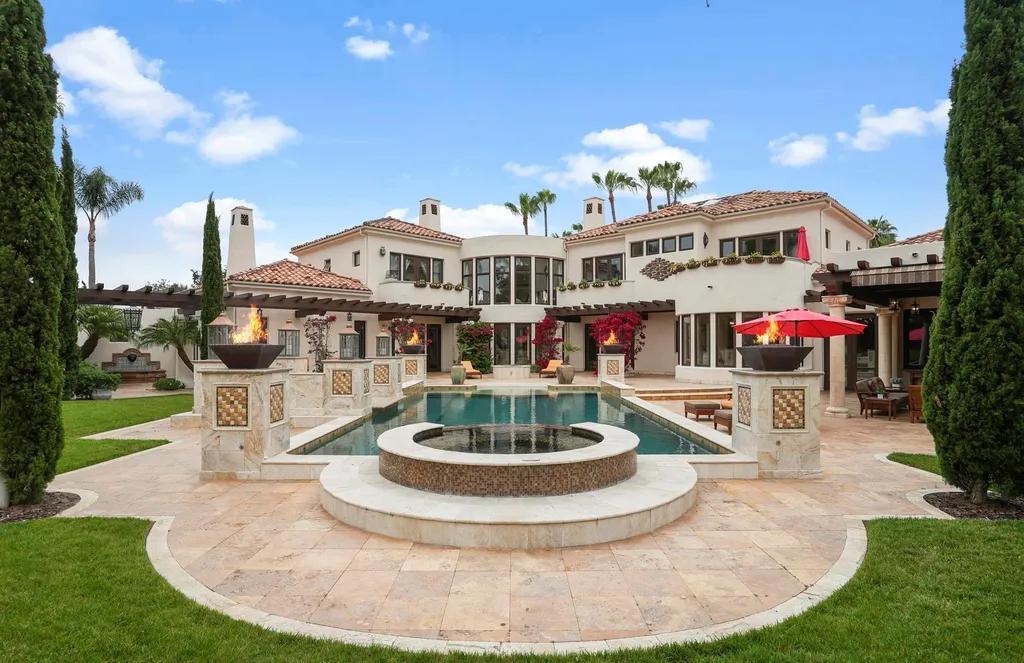 16756 Los Morros Home in Rancho Santa Fe, California. Explore this magnificent Mediterranean estate in Rancho Santa Fe's coveted Covenant. Situated on nearly two acres of lush grounds, this grand residence effortlessly combines opulence with a welcoming ambiance. With impressive features including a paradise pool, gourmet kitchen, spacious living areas, and luxurious amenities, this estate offers the epitome of refined living. Discover a luxurious retreat that seamlessly blends grandeur, comfort, and sophistication in one of Southern California's most prestigious neighborhoods.