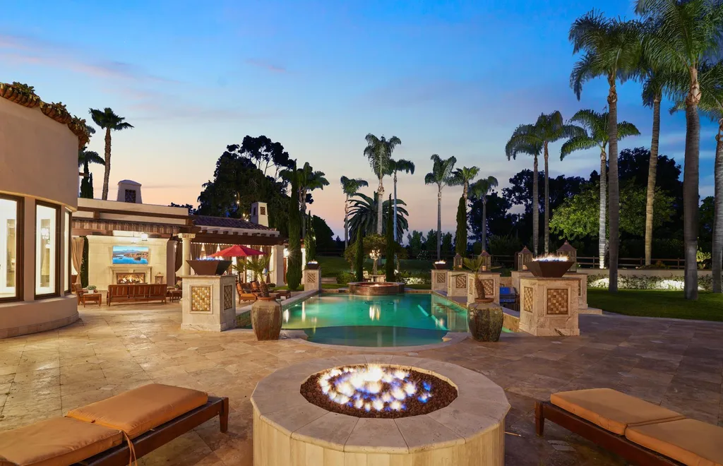 16756 Los Morros Home in Rancho Santa Fe, California. Explore this magnificent Mediterranean estate in Rancho Santa Fe's coveted Covenant. Situated on nearly two acres of lush grounds, this grand residence effortlessly combines opulence with a welcoming ambiance. With impressive features including a paradise pool, gourmet kitchen, spacious living areas, and luxurious amenities, this estate offers the epitome of refined living. Discover a luxurious retreat that seamlessly blends grandeur, comfort, and sophistication in one of Southern California's most prestigious neighborhoods.