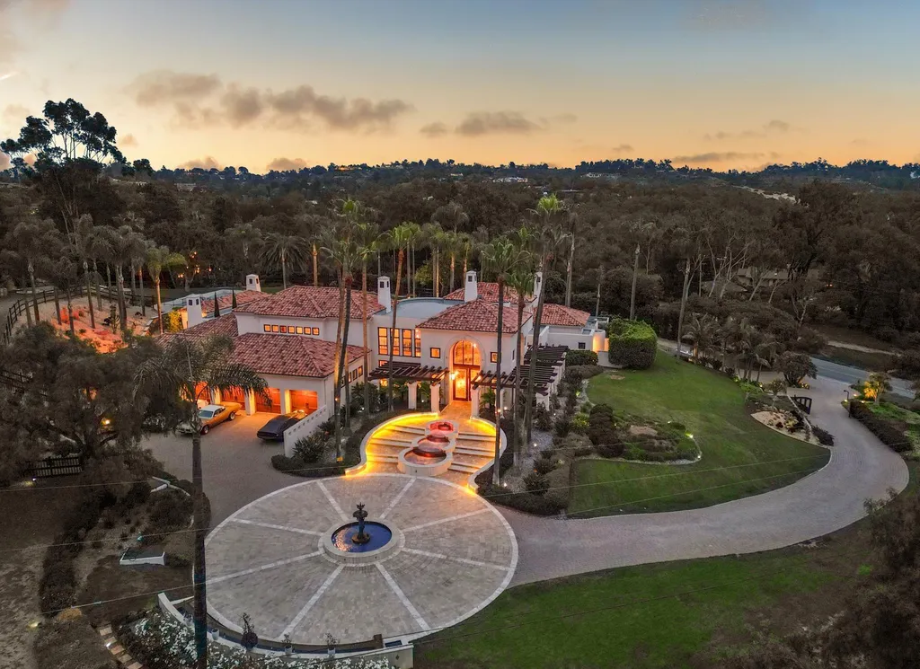 16756 Los Morros Home in Rancho Santa Fe, California. Explore this magnificent Mediterranean estate in Rancho Santa Fe's coveted Covenant. Situated on nearly two acres of lush grounds, this grand residence effortlessly combines opulence with a welcoming ambiance. With impressive features including a paradise pool, gourmet kitchen, spacious living areas, and luxurious amenities, this estate offers the epitome of refined living. Discover a luxurious retreat that seamlessly blends grandeur, comfort, and sophistication in one of Southern California's most prestigious neighborhoods.