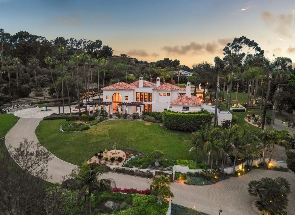 16756 Los Morros Home in Rancho Santa Fe, California. Explore this magnificent Mediterranean estate in Rancho Santa Fe's coveted Covenant. Situated on nearly two acres of lush grounds, this grand residence effortlessly combines opulence with a welcoming ambiance. With impressive features including a paradise pool, gourmet kitchen, spacious living areas, and luxurious amenities, this estate offers the epitome of refined living. Discover a luxurious retreat that seamlessly blends grandeur, comfort, and sophistication in one of Southern California's most prestigious neighborhoods.
