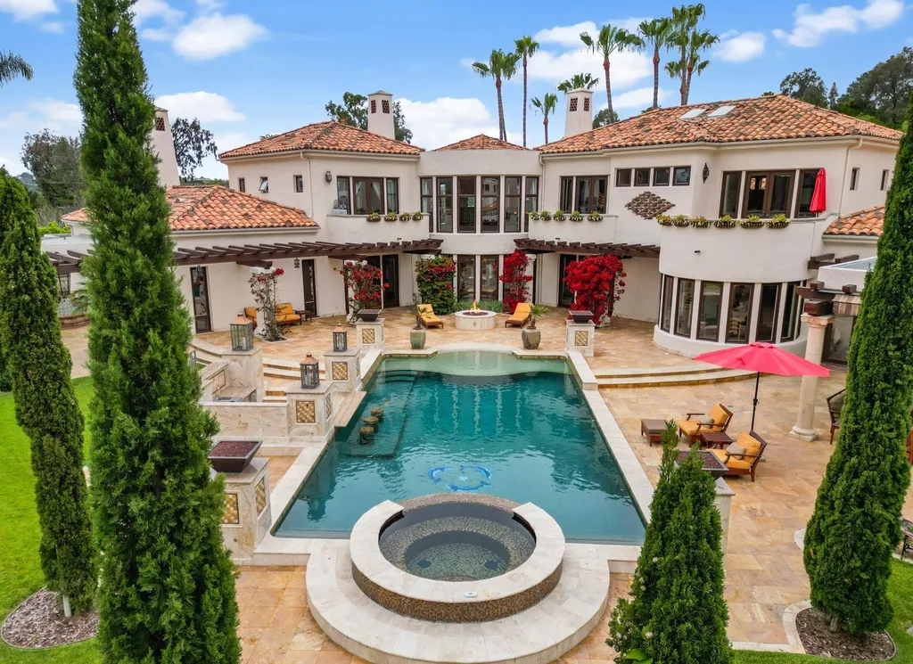 16756 Los Morros Home in Rancho Santa Fe, California. Explore this magnificent Mediterranean estate in Rancho Santa Fe's coveted Covenant. Situated on nearly two acres of lush grounds, this grand residence effortlessly combines opulence with a welcoming ambiance. With impressive features including a paradise pool, gourmet kitchen, spacious living areas, and luxurious amenities, this estate offers the epitome of refined living. Discover a luxurious retreat that seamlessly blends grandeur, comfort, and sophistication in one of Southern California's most prestigious neighborhoods.