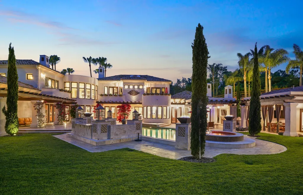 16756 Los Morros Home in Rancho Santa Fe, California. Explore this magnificent Mediterranean estate in Rancho Santa Fe's coveted Covenant. Situated on nearly two acres of lush grounds, this grand residence effortlessly combines opulence with a welcoming ambiance. With impressive features including a paradise pool, gourmet kitchen, spacious living areas, and luxurious amenities, this estate offers the epitome of refined living. Discover a luxurious retreat that seamlessly blends grandeur, comfort, and sophistication in one of Southern California's most prestigious neighborhoods.