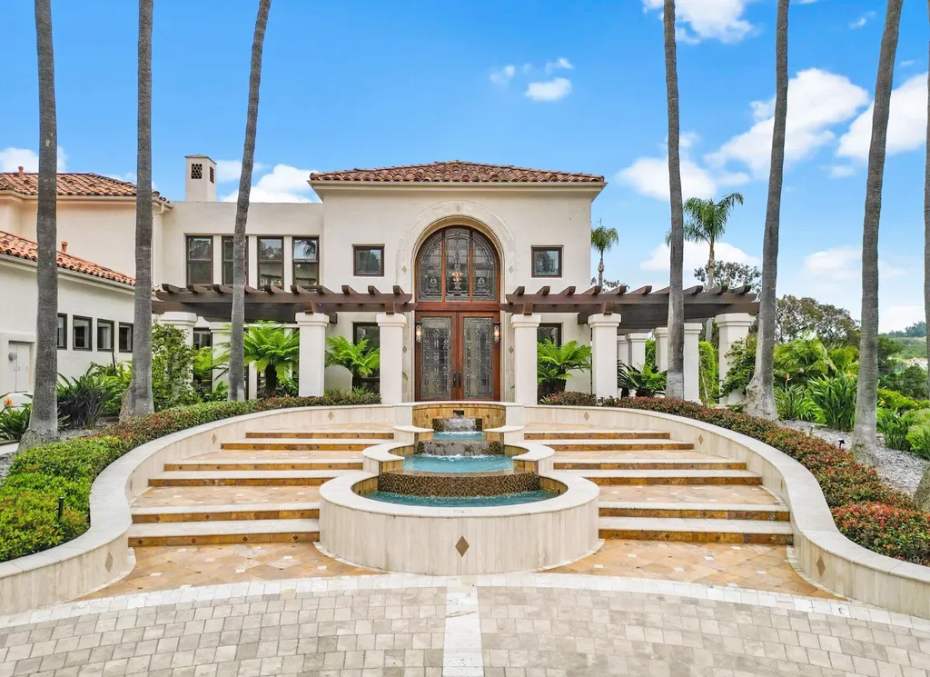 16756 Los Morros Home in Rancho Santa Fe, California. Explore this magnificent Mediterranean estate in Rancho Santa Fe's coveted Covenant. Situated on nearly two acres of lush grounds, this grand residence effortlessly combines opulence with a welcoming ambiance. With impressive features including a paradise pool, gourmet kitchen, spacious living areas, and luxurious amenities, this estate offers the epitome of refined living. Discover a luxurious retreat that seamlessly blends grandeur, comfort, and sophistication in one of Southern California's most prestigious neighborhoods.