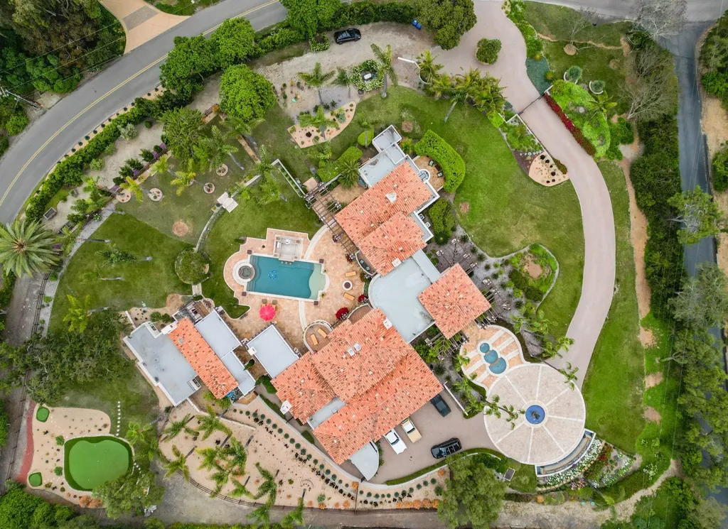 16756 Los Morros Home in Rancho Santa Fe, California. Explore this magnificent Mediterranean estate in Rancho Santa Fe's coveted Covenant. Situated on nearly two acres of lush grounds, this grand residence effortlessly combines opulence with a welcoming ambiance. With impressive features including a paradise pool, gourmet kitchen, spacious living areas, and luxurious amenities, this estate offers the epitome of refined living. Discover a luxurious retreat that seamlessly blends grandeur, comfort, and sophistication in one of Southern California's most prestigious neighborhoods.