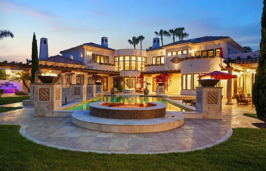 16756 Los Morros Home in Rancho Santa Fe, California. Explore this magnificent Mediterranean estate in Rancho Santa Fe's coveted Covenant. Situated on nearly two acres of lush grounds, this grand residence effortlessly combines opulence with a welcoming ambiance. With impressive features including a paradise pool, gourmet kitchen, spacious living areas, and luxurious amenities, this estate offers the epitome of refined living. Discover a luxurious retreat that seamlessly blends grandeur, comfort, and sophistication in one of Southern California's most prestigious neighborhoods.
